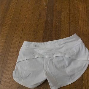 Lululemon speed ups  white shorts perfect condition size 4 2in